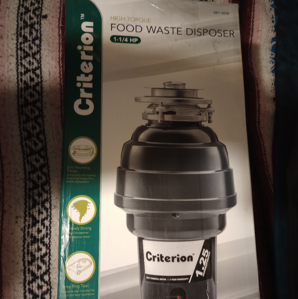 BRAND NEW GARBAGE DISPOSAL( SOLD )